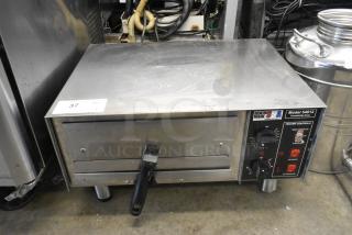 2022 Benchmark USA 54012 stainless steel commercial countertop pizza oven, electric powered, 120V, good condition.