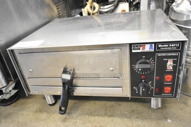 2022 Benchmark USA 54012 stainless steel countertop pizza oven with heater controls. Model 54012, 120 volts, 1 phase.