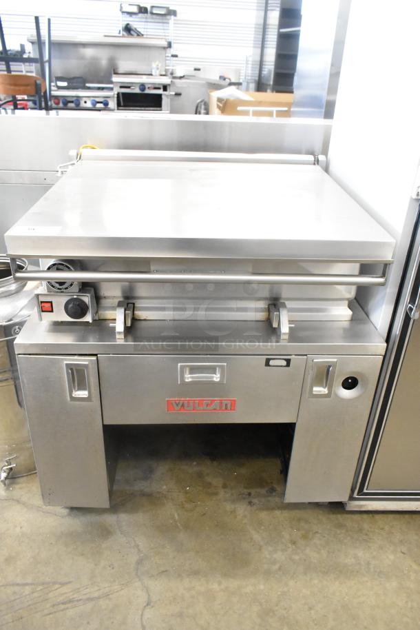 Vulcan stainless steel commercial braising pan on casters, features front controls, branded logo, excellent condition.