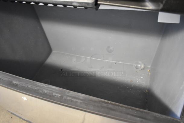 Manitowoc IY1106A-261 ice head on bin, stainless steel, 208-230V, 1 phase, good condition, commercial use.