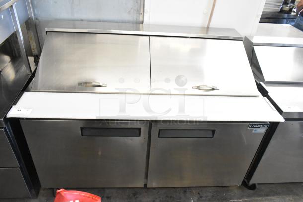 Dukers DSP60 stainless steel commercial prep table with bain marie top, on casters. Model DSP60, 115V, 1 phase.