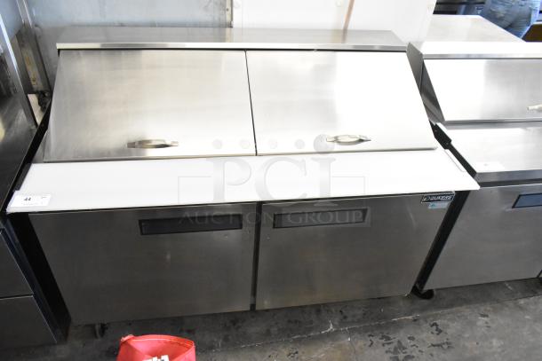 Dukers DSP60 stainless steel commercial sandwich salad prep table with Bain Marie mega top, on casters, 115V, 1 phase.