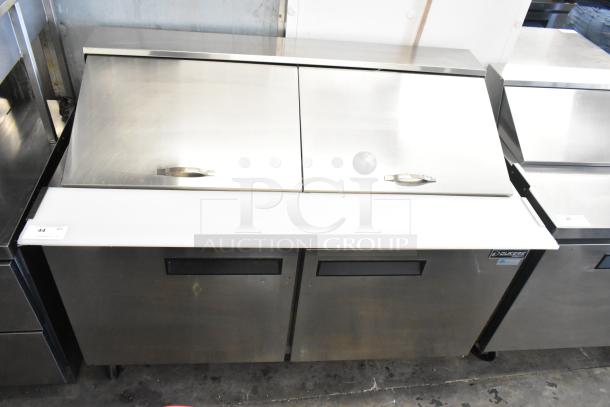 Dukers DSP60 stainless steel prep table, mega top design, on commercial casters. Includes 115V, 1 phase.