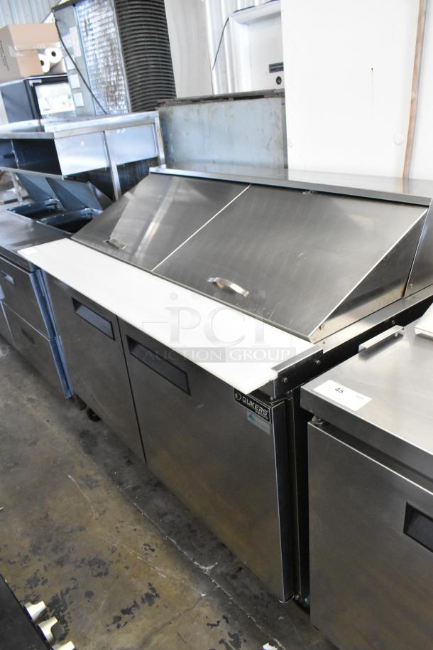 Dukers DSP60 stainless steel sandwich salad prep table with bain marie mega top. Commercial casters, 115V, 1 phase.