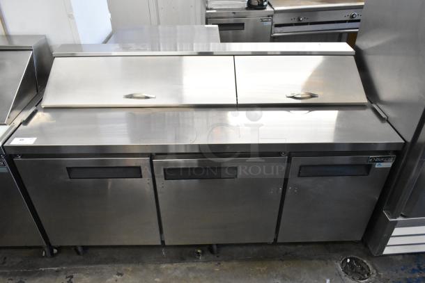 Dukers DSP72 stainless steel prep table with bain marie top, commercial casters, 115V, 1 phase. Excellent condition.