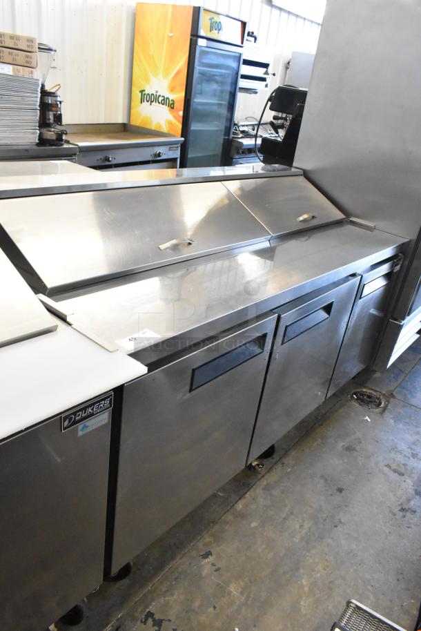 Dukers DSP72 stainless steel commercial sandwich salad prep table; bain marie mega top, on casters, 115V, 1 Phase.