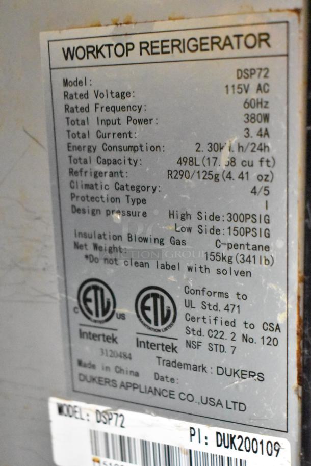 Dukers DSP72 label showing model details: 115V AC, 498L capacity, R290 refrigerant, certified by UL, CSA, NSF.