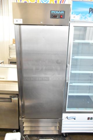 Polar GE004 stainless steel commercial single door reach-in cooler with poly coated racks and casters. 115V, 1 phase.