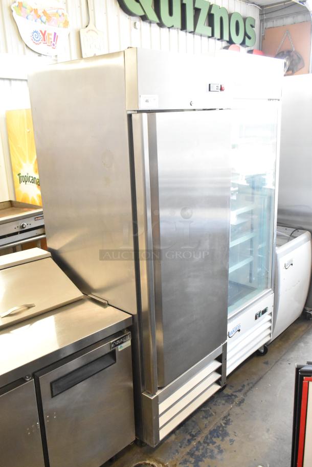 Polar GE004 stainless steel commercial single-door cooler with poly-coated racks and casters. 115 Volts, 1 phase.