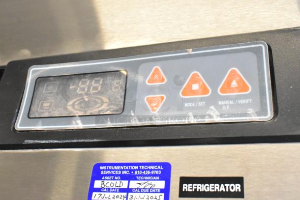 Close-up of control panel on Summit ARS49ML stainless steel commercial cooler, showing digital display and buttons.
