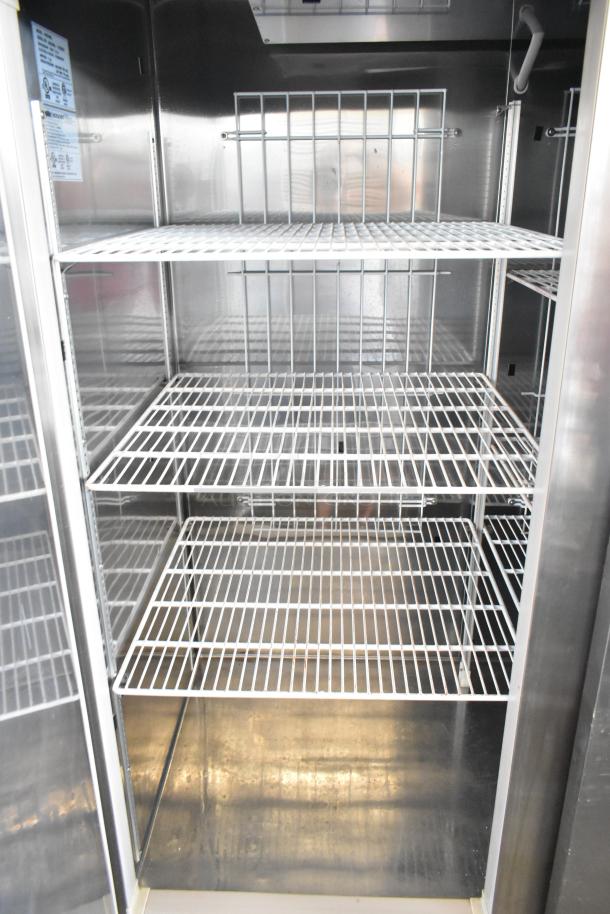 Summit ARS49ML stainless steel commercial 2-door cooler with poly coated racks, commercial casters, 115V, 1 phase.