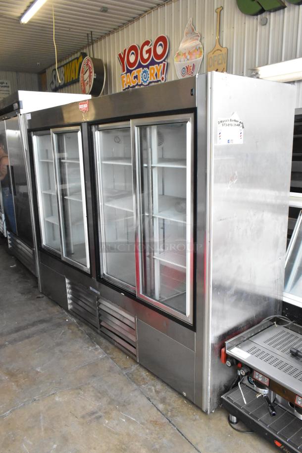 Leader LS96S S/C metal commercial 4-door reach-in cooler with poly-coated racks. Model LS96S S/C, 115V, 1 phase, excellent condition.