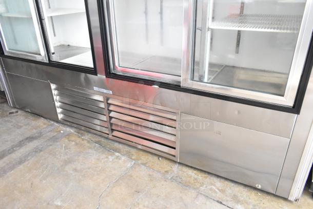 Leader LS96S S/C 4 Door Reach In Cooler with poly coated racks. Features stainless steel finish, 115V, 1 Phase.