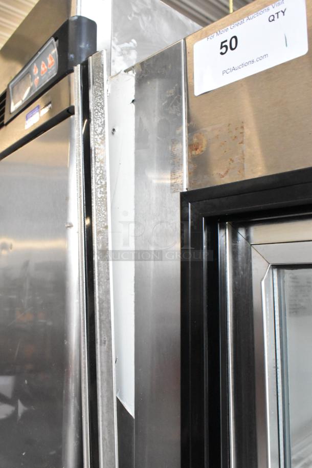 Leader LS96S S/C commercial cooler with 4 doors and poly-coated racks. 115V, 1 phase. Slight surface wear.