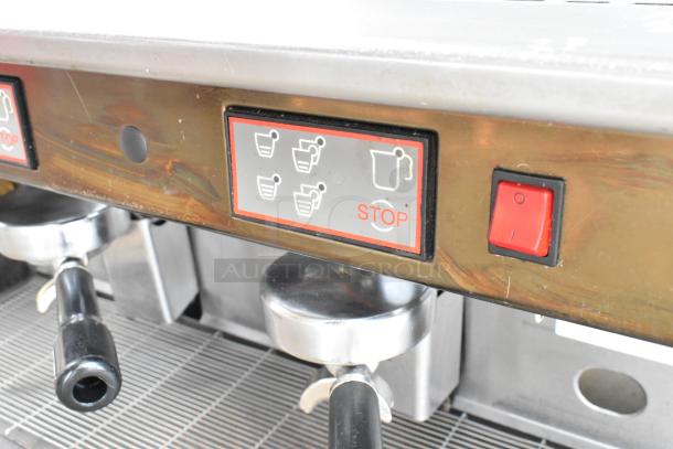 Wega Formula EVO 3 Espresso Machine with portafilters and control panel. Model EVO 3. 220V, features two steam wands.