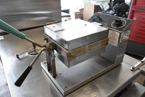 Gold Medal 5024 commercial waffle maker, metal, countertop model, 120 volts, used condition, visible wear and rust.