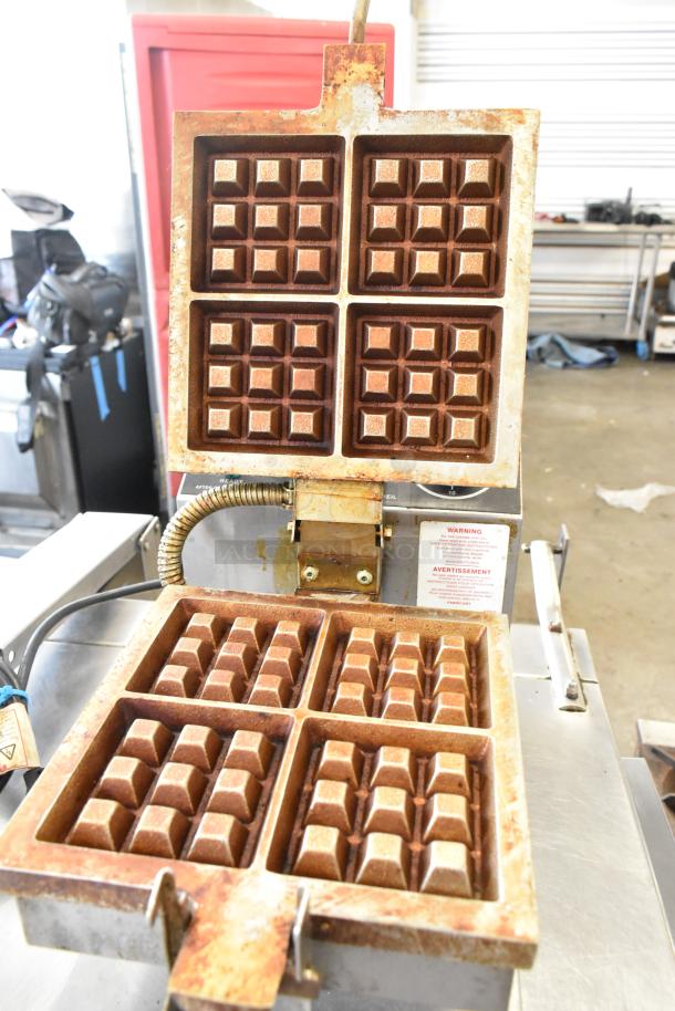 Gold Medal 5024 Commercial Waffle Maker, 120V, metal construction, used condition, shows wear, warning label visible.
