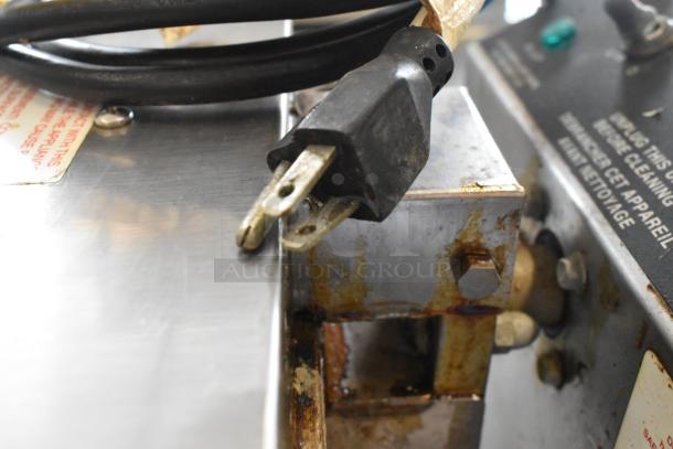 Gold Medal 5024 Metal Commercial Waffle Maker, showing power plug and control panel. Signs of wear, 120 Volts, 1 Phase.