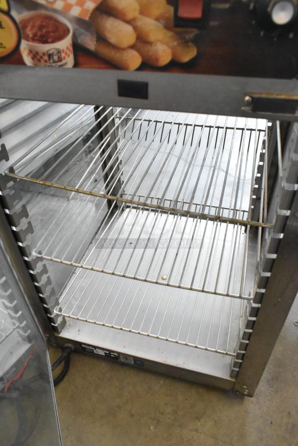 Metal Commercial Countertop Merchandiser, Model 00925E-073. Features wire shelves, glass door; 120 Volts, 1 Phase.