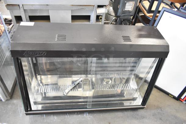 2023 Avantco 177HDC48 countertop heated display case, 120 volts, metal, glass front, new condition, brand marking visible.