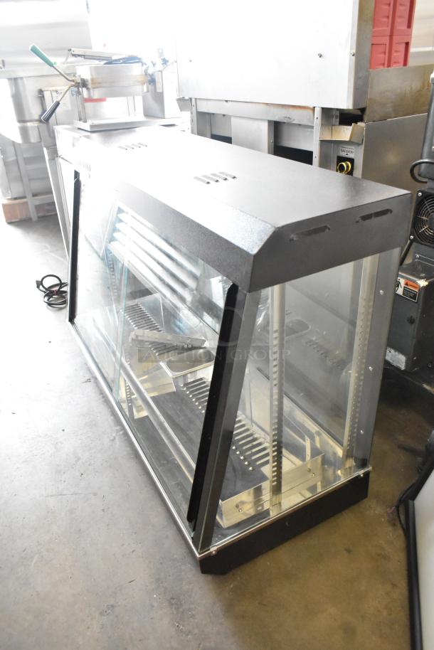 2023 Avantco 177HDC48 metal commercial countertop heated display case merchandiser, 120V, 1 Phase, excellent condition.