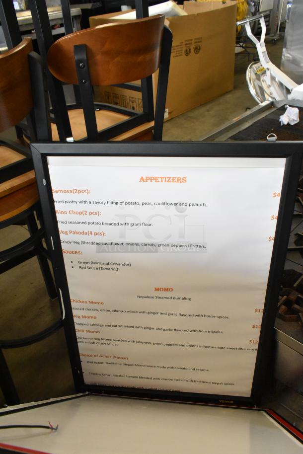 Four framed menu boards featuring appetizer listings. Black frames, clear text. Sturdy condition, ideal for restaurants.