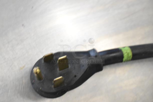 Power plug for Southbend RS-4E Steam Cabinet. Black with three prongs, suited for 208 volts, 1/3 phase electric supply.