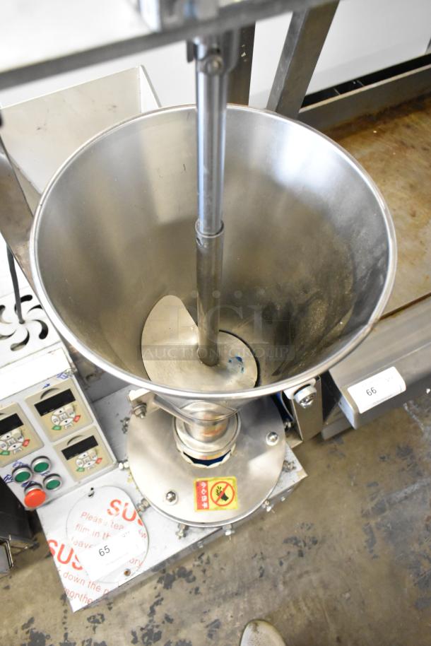 Stainless steel commercial unit with MNMRV40 gear reducer on casters, control panel visible, used condition.