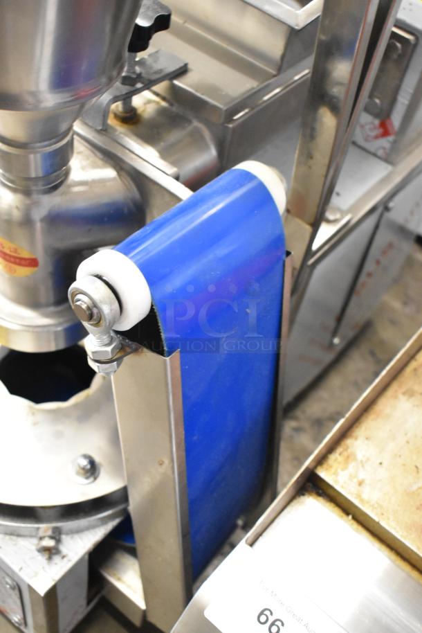 Stainless steel commercial unit on casters with MNMRV40 gear reducer, features blue belt and durable construction.