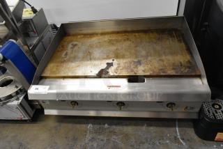 2023 CPG 351GTCPG36NL stainless steel natural gas griddle, 90,000 BTU, used condition, auction tag visible.