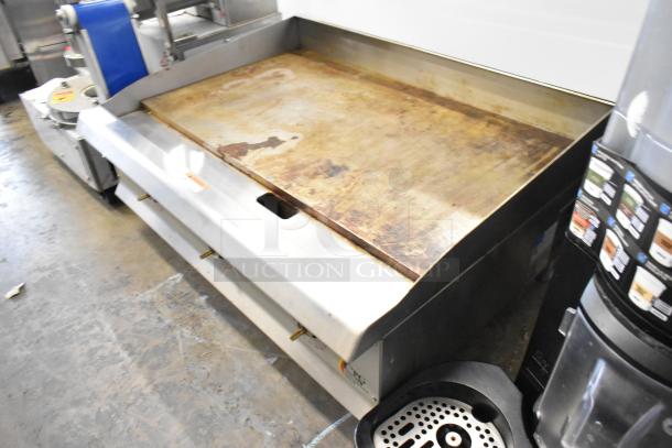 2023 Cooking Performance Group CPG 351GTCPG36NL stainless steel commercial griddle, natural gas, 90,000 BTU, used.