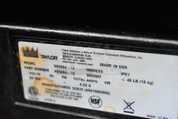 Taylor X83684-12 commercial frozen drink mixer, metal, countertop model. Condition: Used. Made in USA. NSF certified.