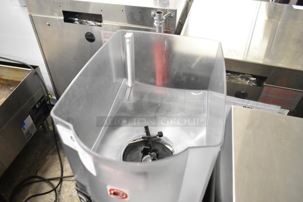Taylor X83684-12 metal commercial frozen drink mixing machine, stainless steel, in good condition, seen from above.