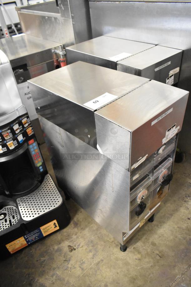 Bunn ICDD-3 stainless steel iced coffee dispenser, commercial-grade, with reservoir, in good condition. Item tags visible.