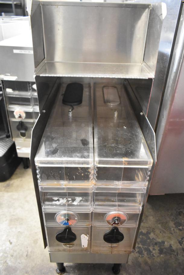 Bunn ICDD-3 stainless steel iced coffee dispenser reservoir, dual compartments, used condition, visible faucets and labels.