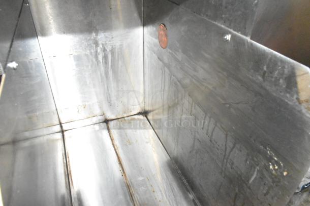 Bunn ICDD-3 stainless steel commercial reservoir interior, showing moderate wear and surface scuffs. Ideal for iced coffee dispensing.