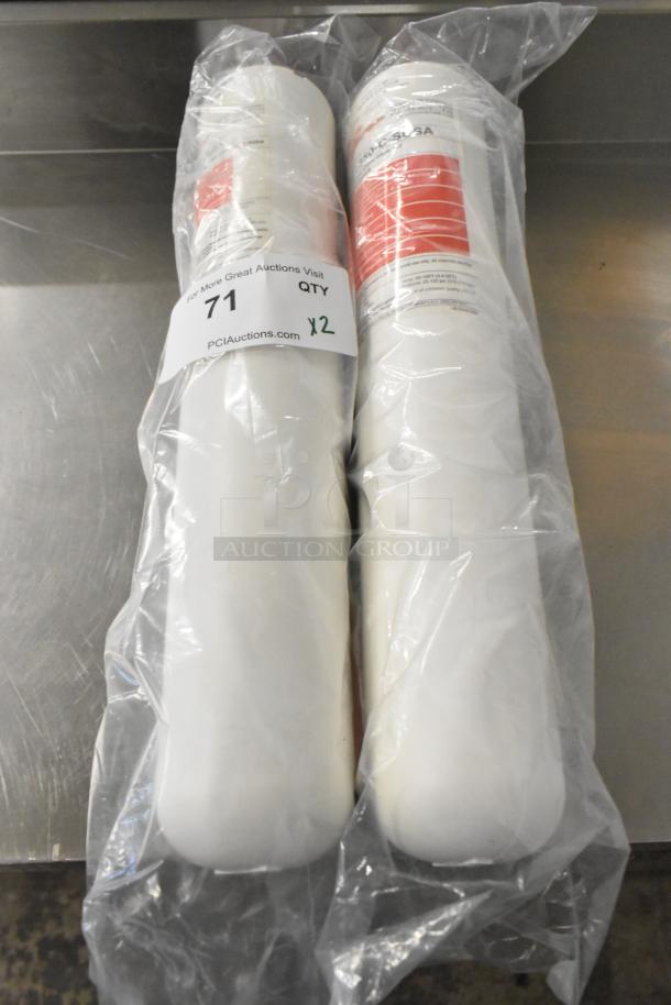 Two Schaerer SWC1350-C-SUSA replacement cartridges in plastic packaging, new condition, auction lot quantity x2.