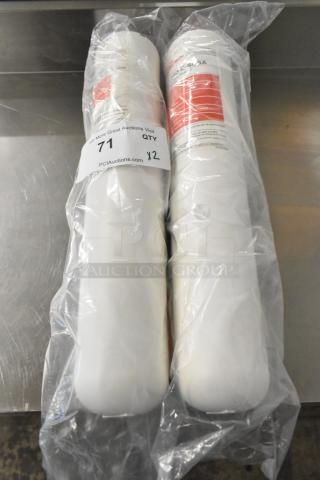 Two Schaerer SWC1350-C-SUSA replacement cartridges in plastic packaging, new condition, auction lot quantity x2.