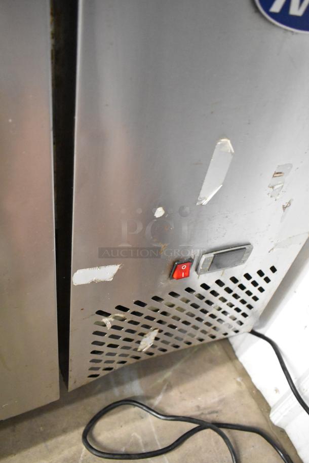 2018 Atosa MPF8202GR stainless steel prep table, visible wear, red power switch, commercial casters, 115V, 1 phase.