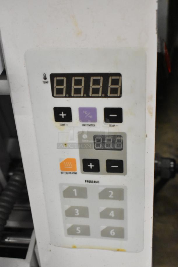 Estella 34BDPC18T metal countertop dough press control panel, showing temperature and program settings, slightly worn condition.