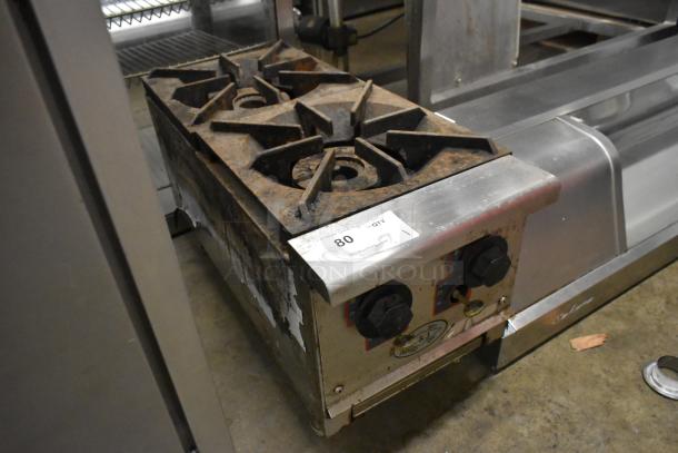 L&J Stainless Steel 2 Burner Range, gas-powered, countertop model. Features signs of wear, visible control knobs, and model label.