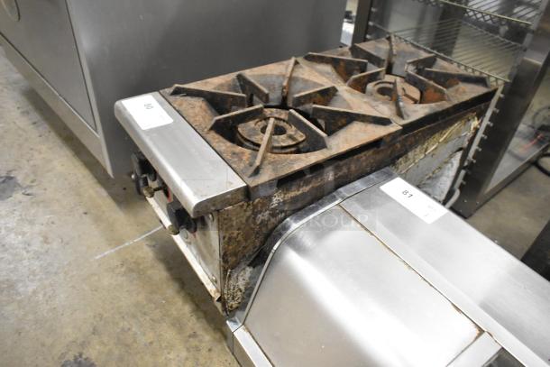 L&J stainless steel commercial countertop gas-powered 2-burner range with visible rust and wear.
