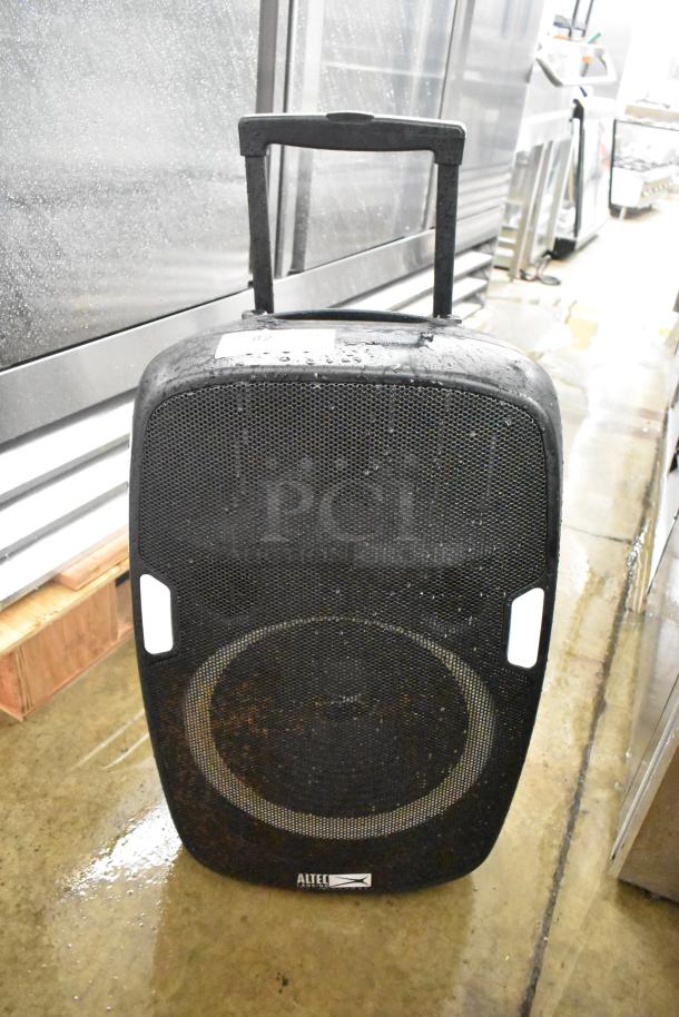 Altec Lansing IMT7002-BLK-FR trolley speaker with handle, black, visible wear, Altec logo, designed for portability.