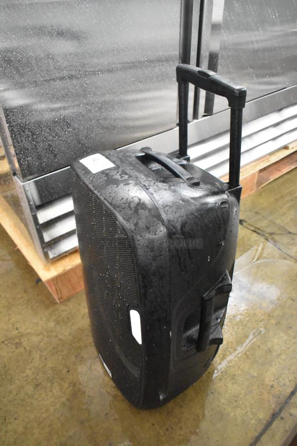 Altec Lansing IMT7002-BLK-FR Trolley Speaker, black, portable, retractable handle, showing some water exposure.