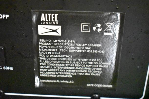Altec Lansing IMT7002-BLK-FR Trolley Speaker label showing model, power info, and FCC compliance.