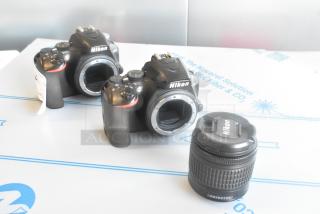 Three Nikon D3500 camera bodies and a Nikon AF-P Nikkor 18-55mm lens, excellent condition, no lens attached to bodies.