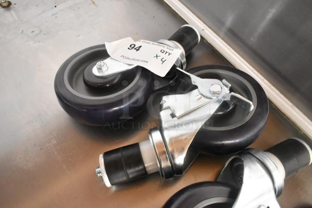 Lot of 4 brand new commercial casters, black with metal fittings; scratch and dent condition. Tag shows "94 QTY x4".