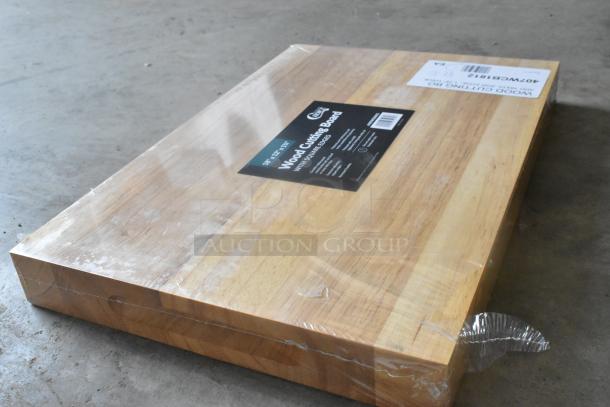 Brand new Choice wood cutting board, 18"x12"x1.75", with squared edges, scratch and dent, wrapped, labeled with details.