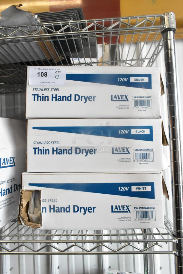 Lavex hand dryers in boxes; satin, white, and black stainless steel models with HEPA filtration, 110/120V, 1,000W, new condition.