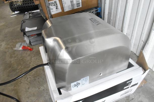 Lavex Pro Satin Stainless Steel Automatic Hand Dryer, 110/120V, 1,800W, with HEPA filtration, scratch and dent model, new.